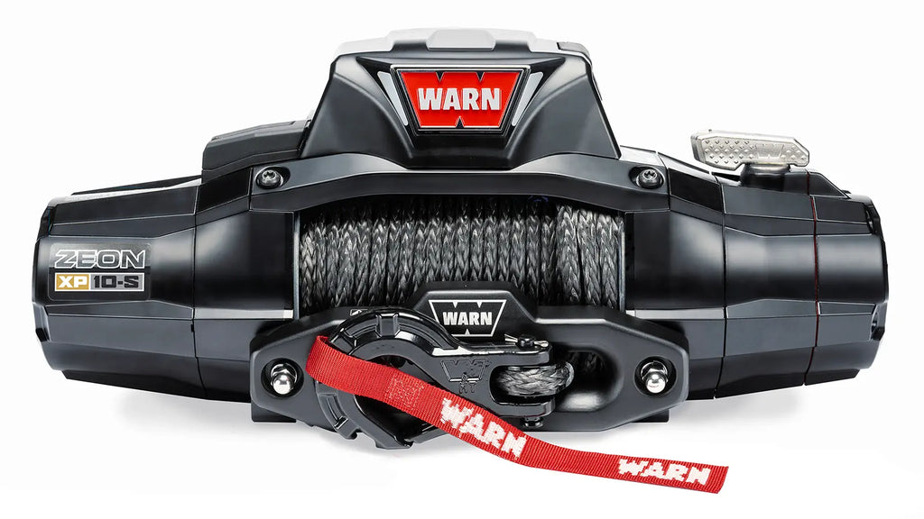 Warn winch with red accents on a white background 10 000 lbs zeon offroad